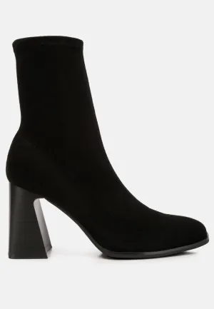 candid high ankle flared block heel boots